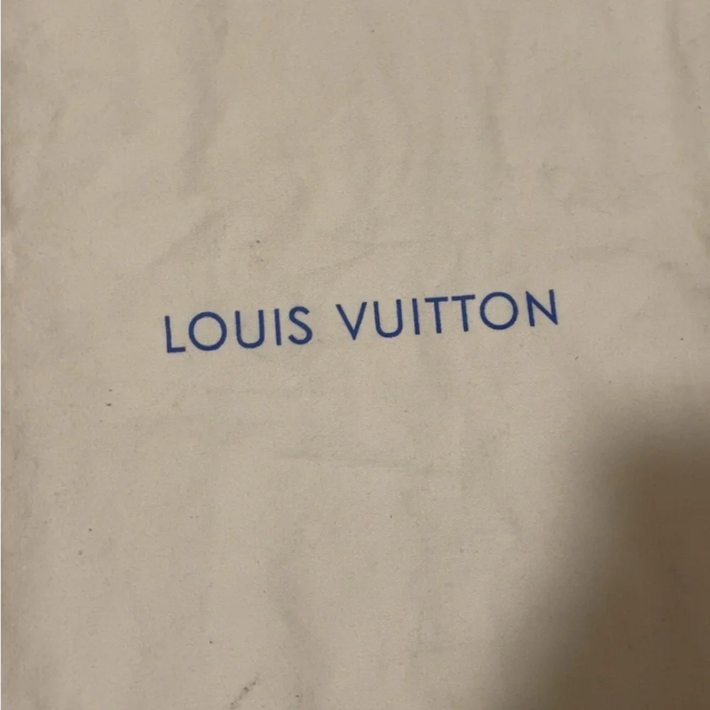 Louis Vuitton Cream Bag with Blue Logo